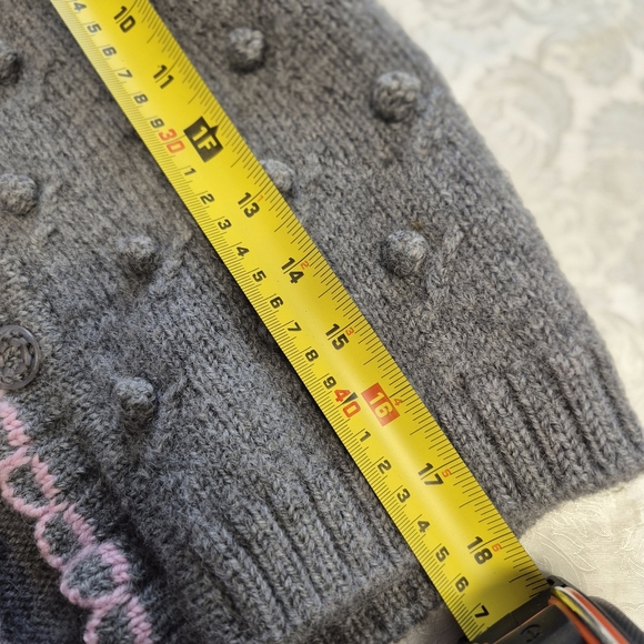 Gray knit  popcorn-stitch baby cardigan with a pink scalloped trim.  - Picture 5 of 6